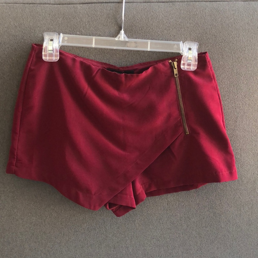 Maroon skort with gold zipper